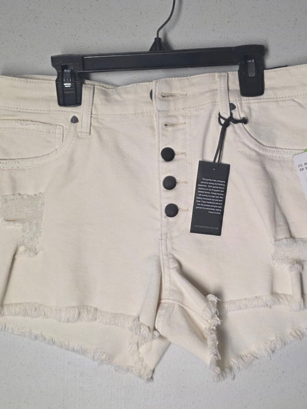 0088 KUT shorts with button fly; Size 8